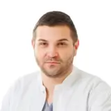 Dr. Razvan Cornia